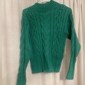 Green cable knit sweater